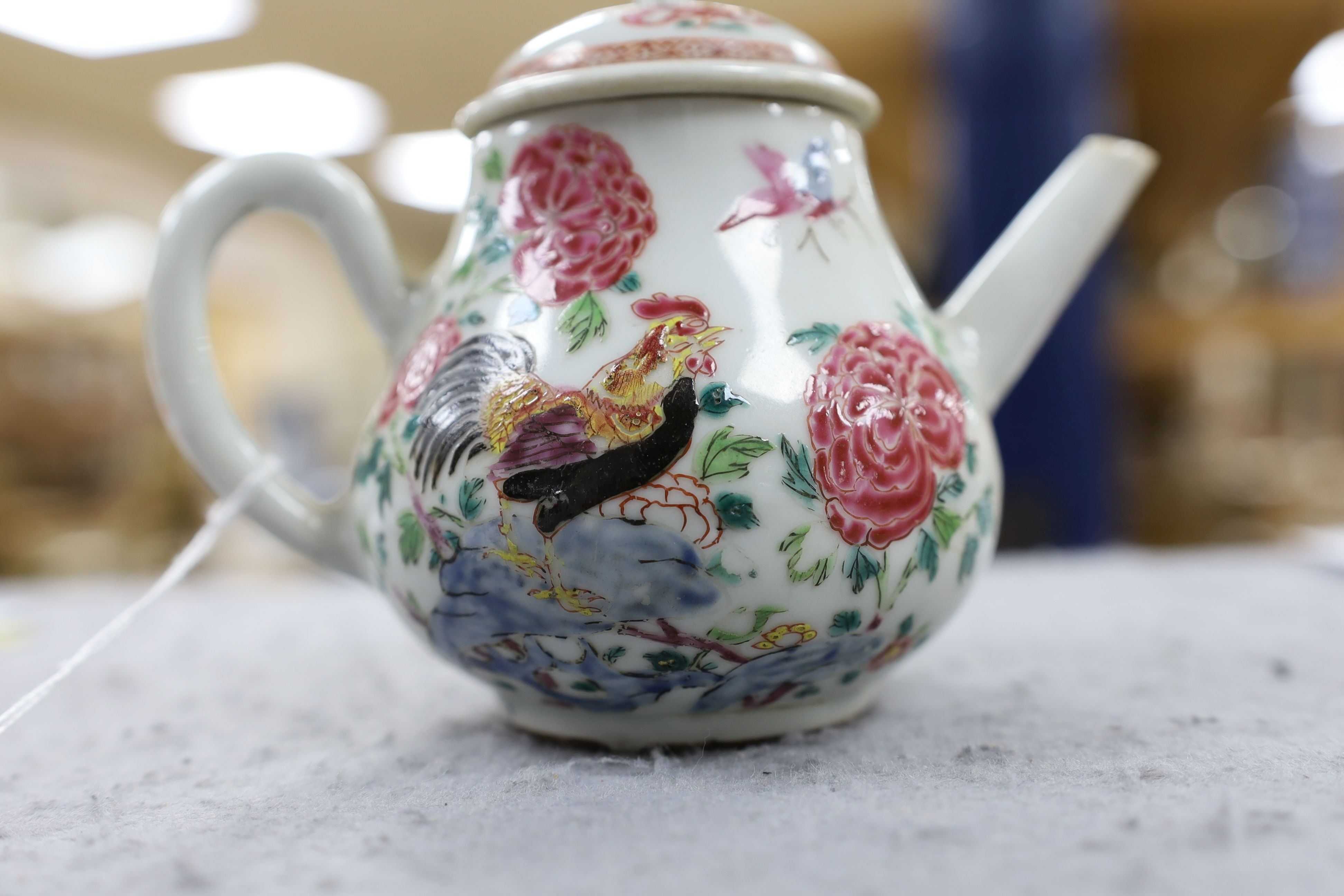 A Chinese famille rose ‘cockerel’ teapot, Yongzheng period, 12 cms high, 11.5cm high